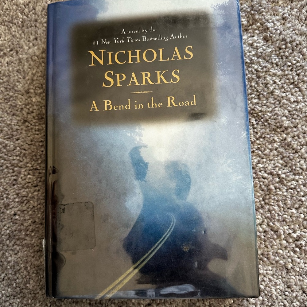 A Bend in the Road Hardcover Book